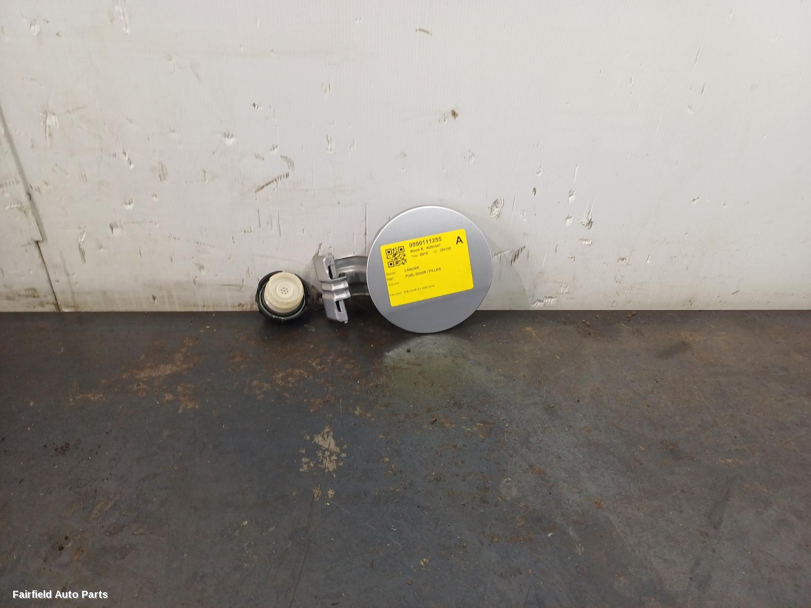 2007-2015 Mitsubishi Lancer Fuel Door Filler