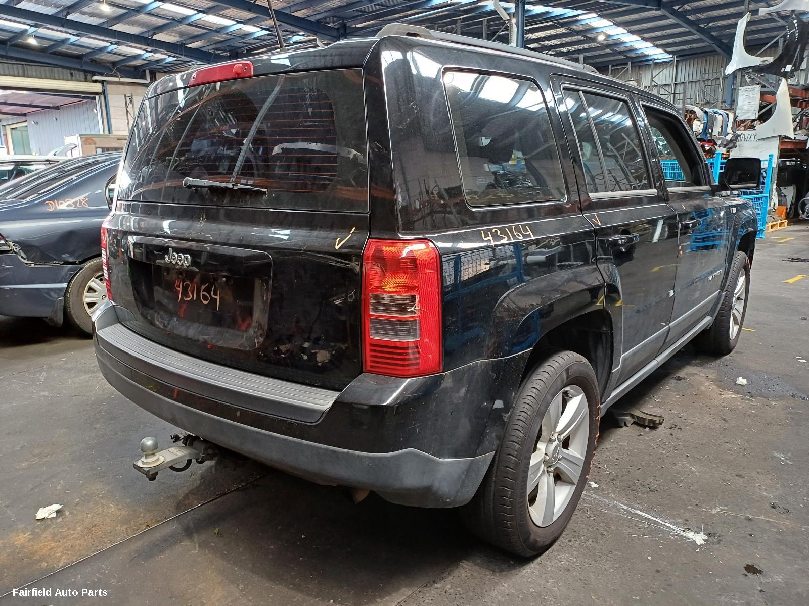 2014 Jeep Patriot Washer Bottle