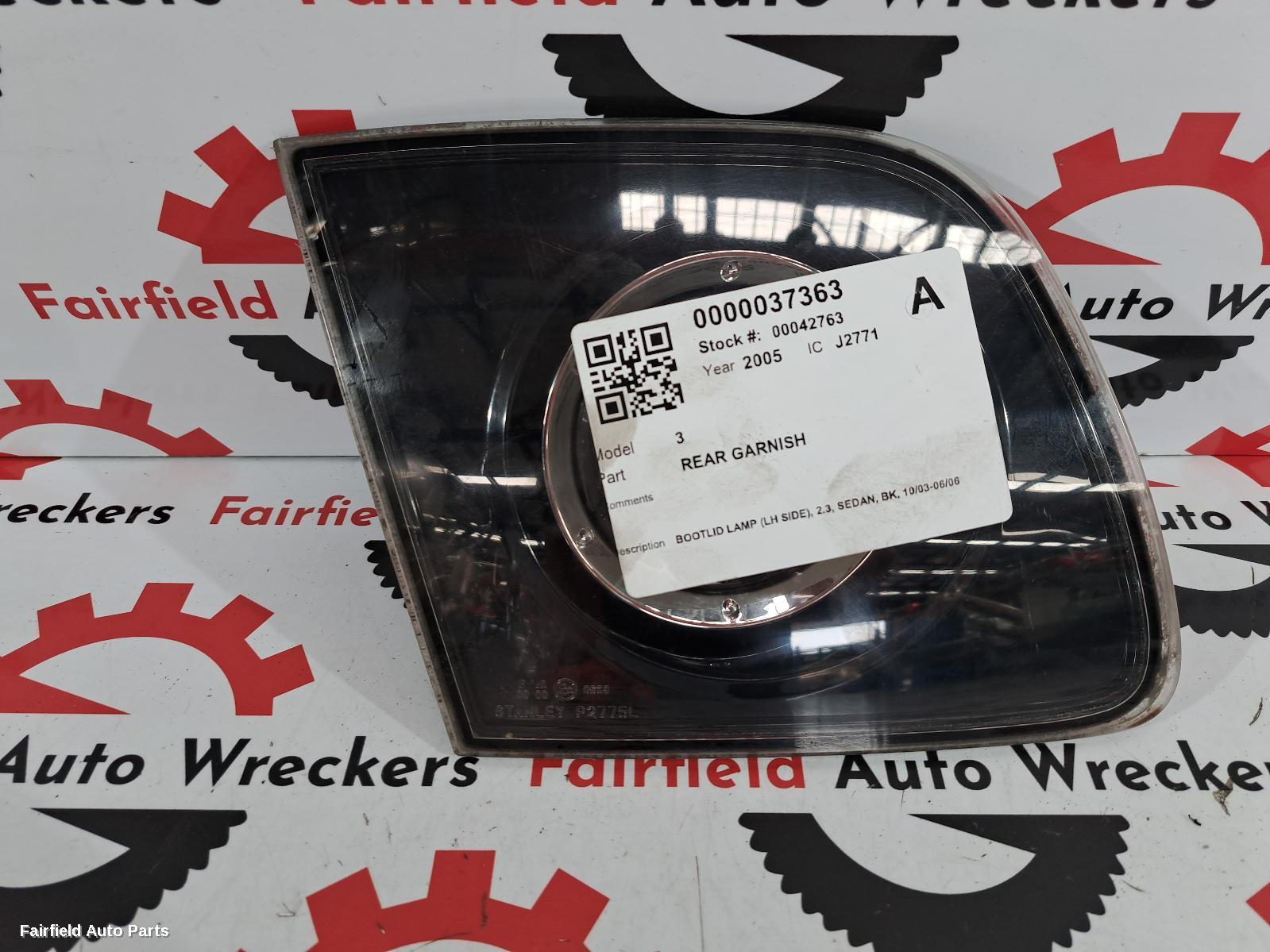 2003-2006 Mazda 3 Rear Garnish