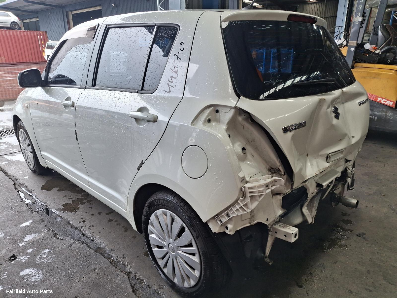 2010 Suzuki Swift Washer Bottle