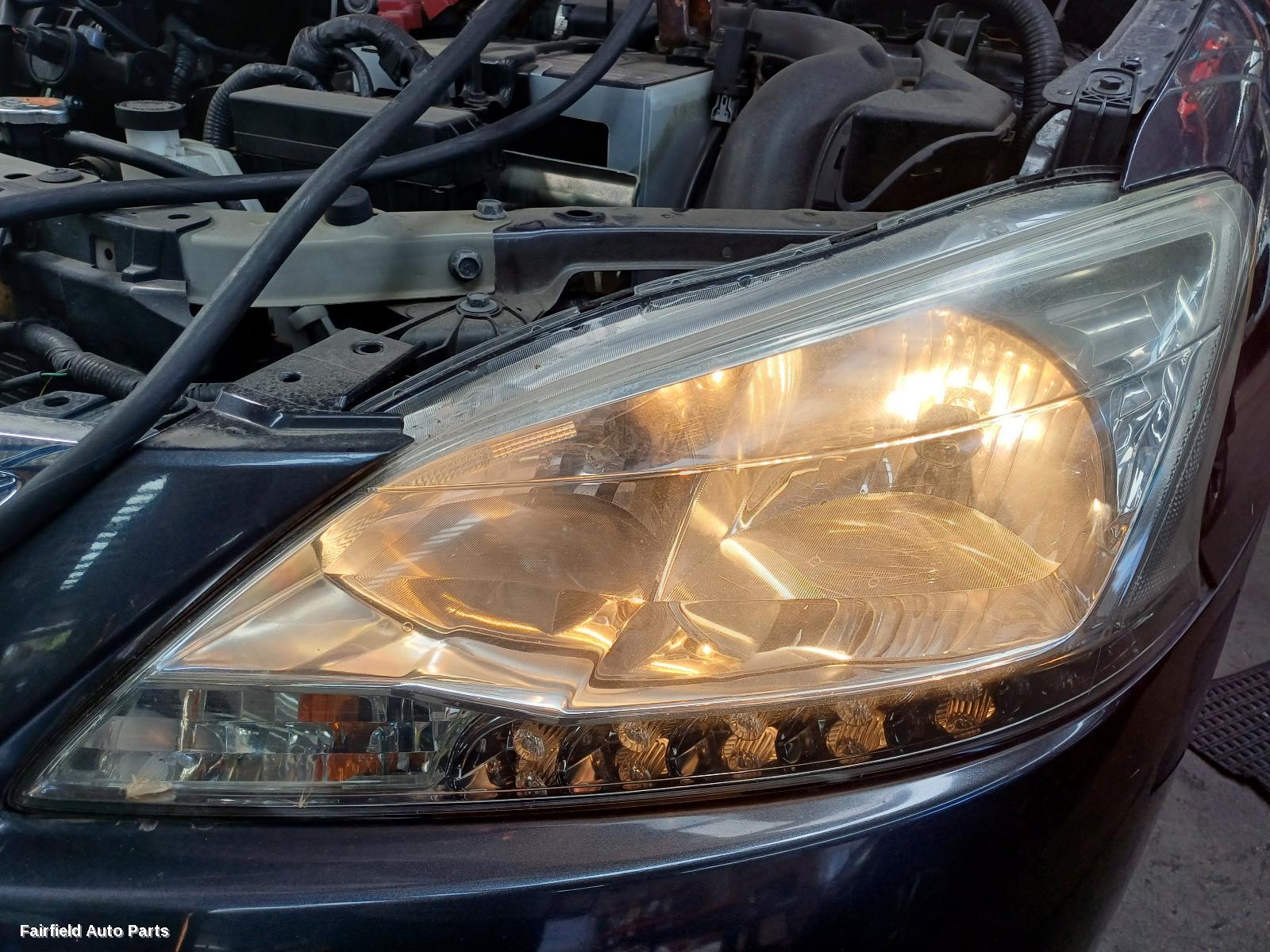 2014 Nissan Pulsar Sunvisor