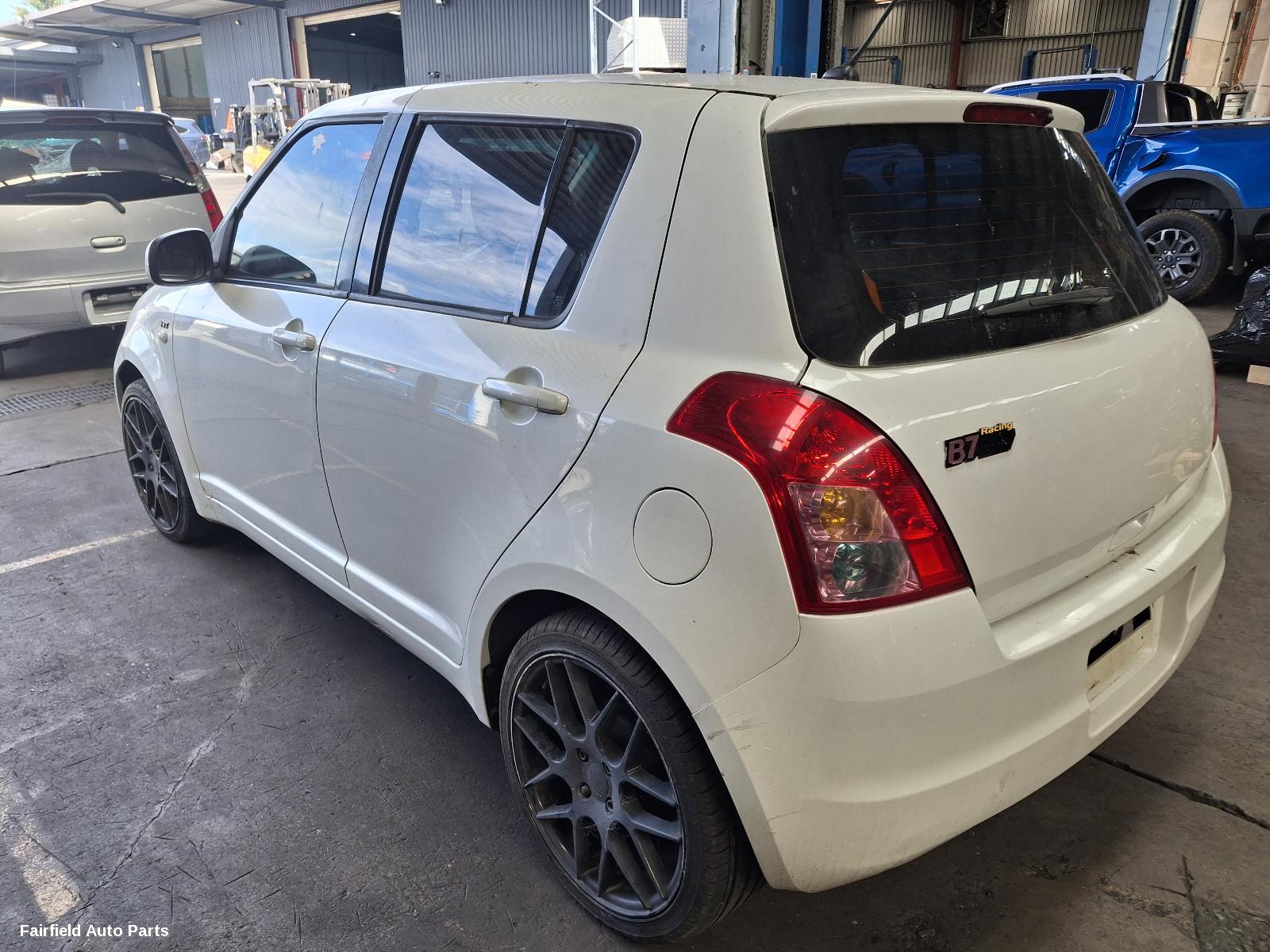 2007 Suzuki Swift Washer Bottle
