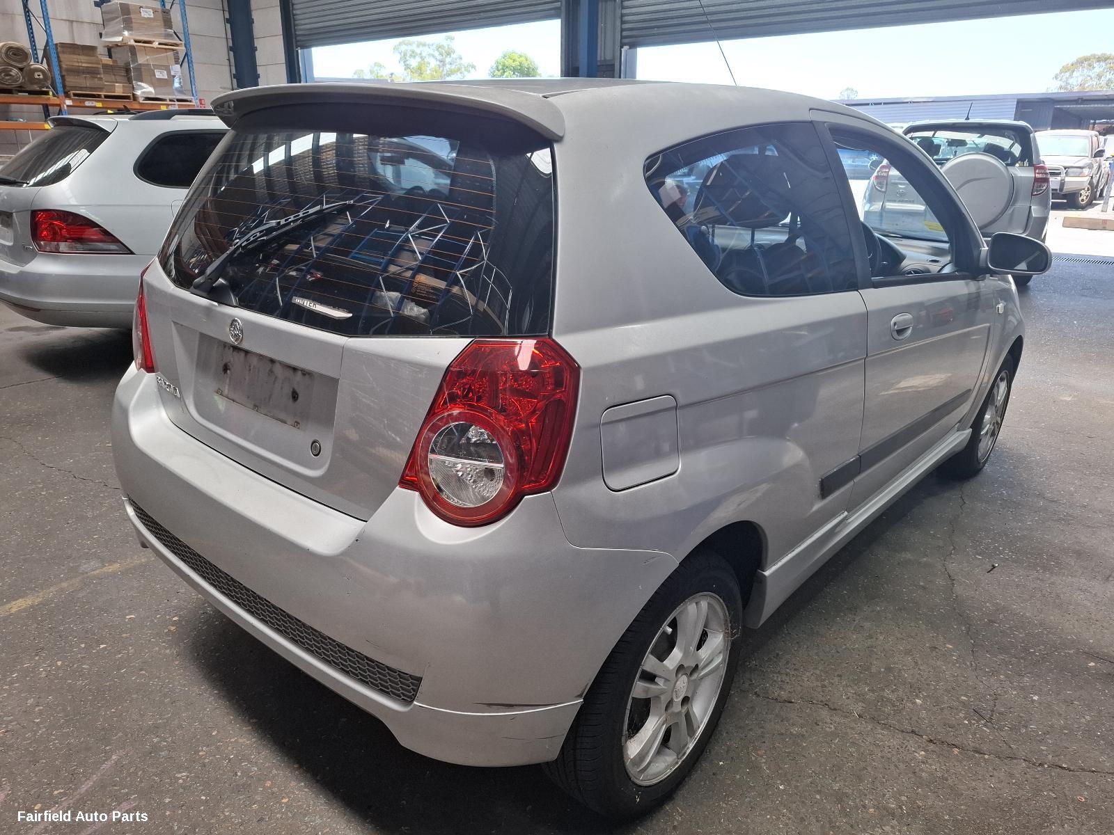 2010 Holden Barina Overflow Bottle