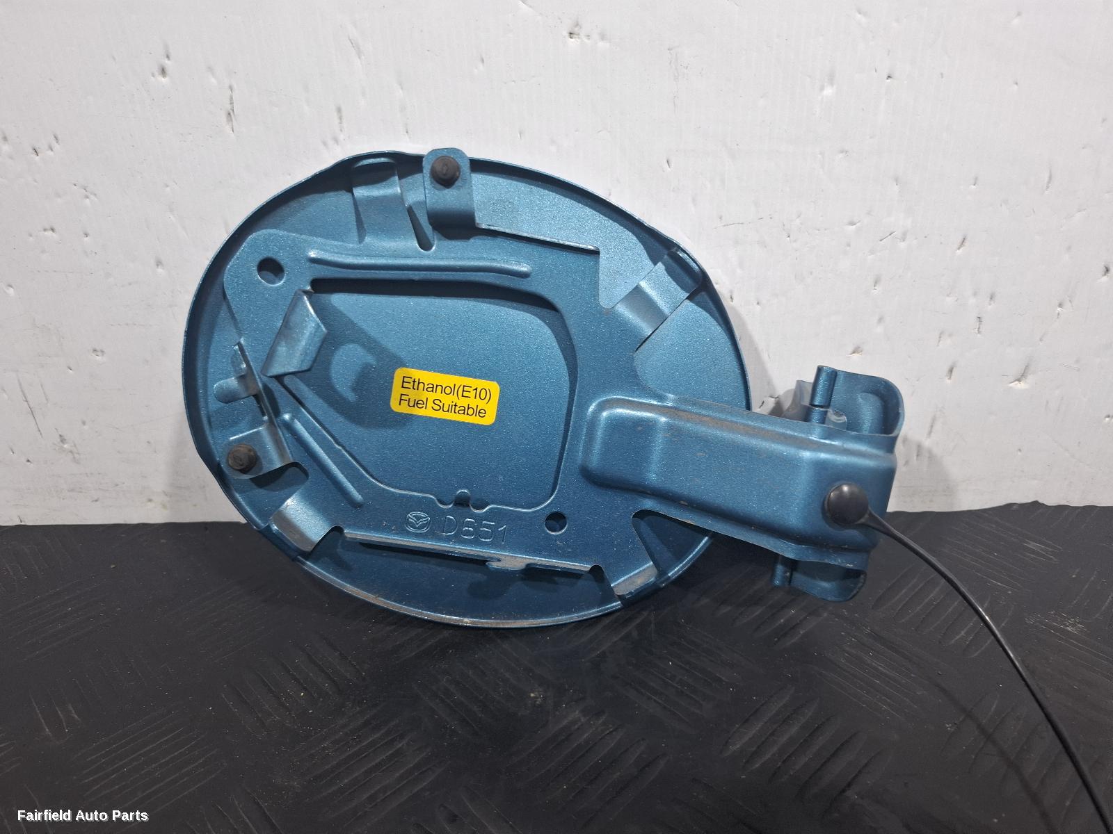 2007-2014 Mazda 2 Fuel Door Filler