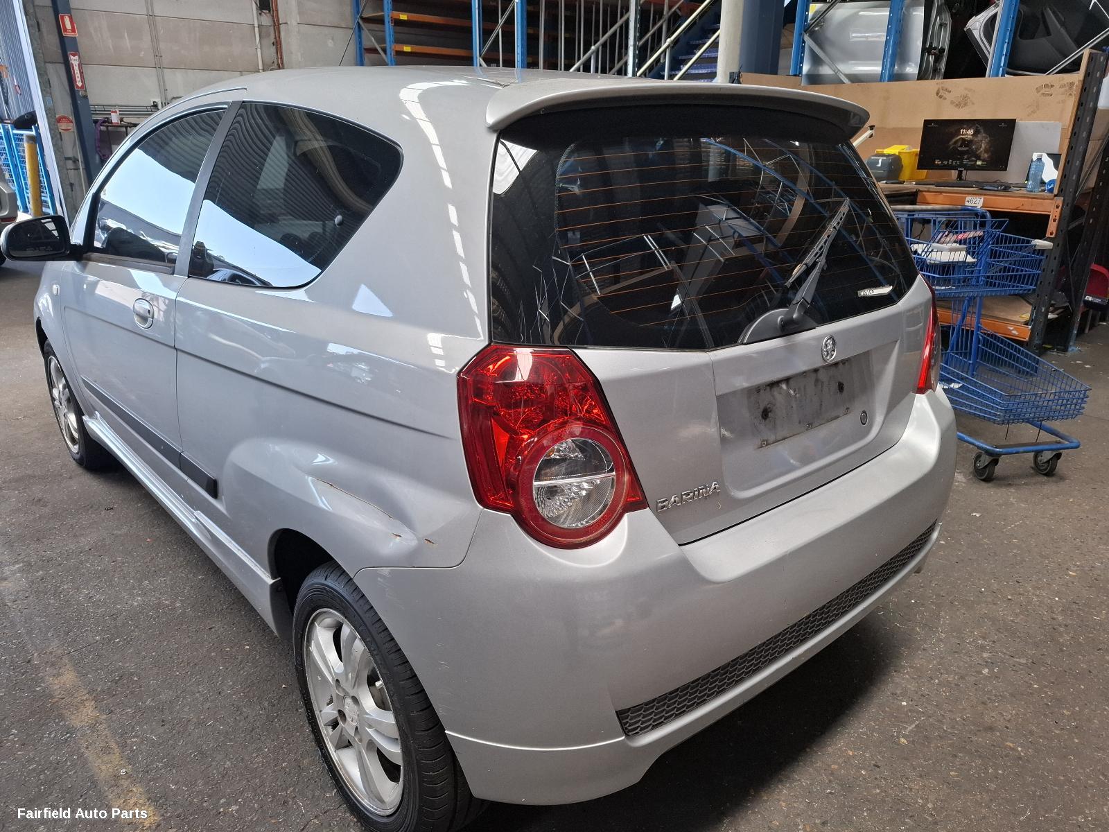 2010 Holden Barina Overflow Bottle
