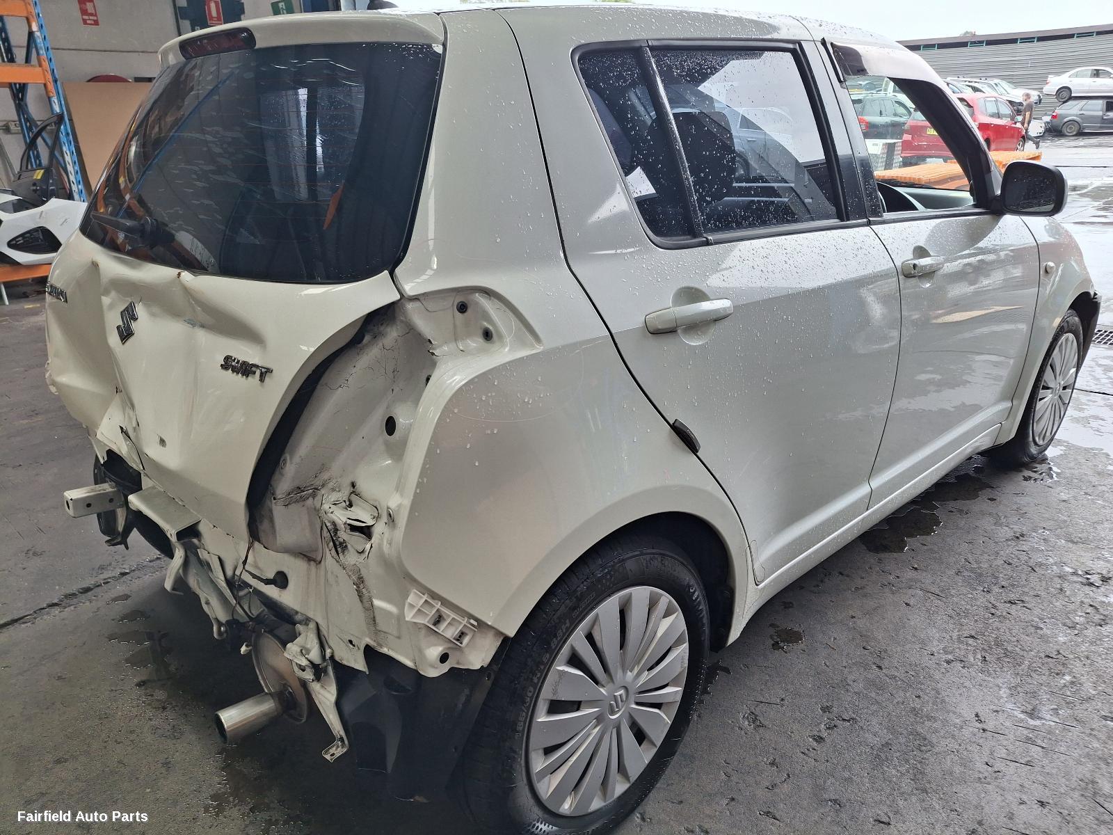 2010 Suzuki Swift Washer Bottle