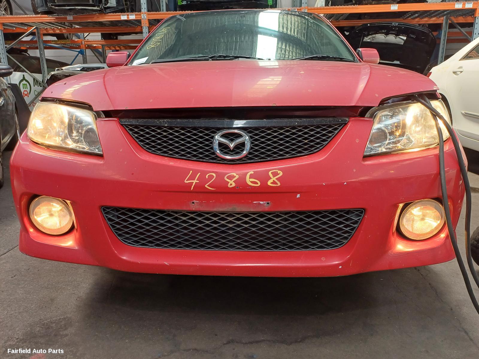 2001 Mazda 323 Washer Bottle