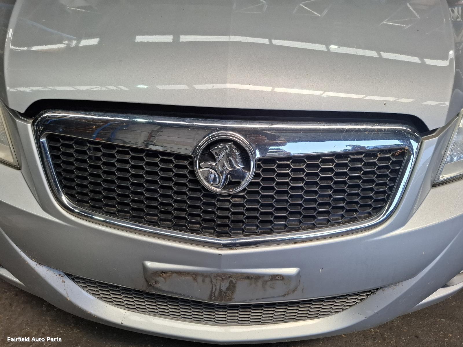 2010 Holden Barina Overflow Bottle