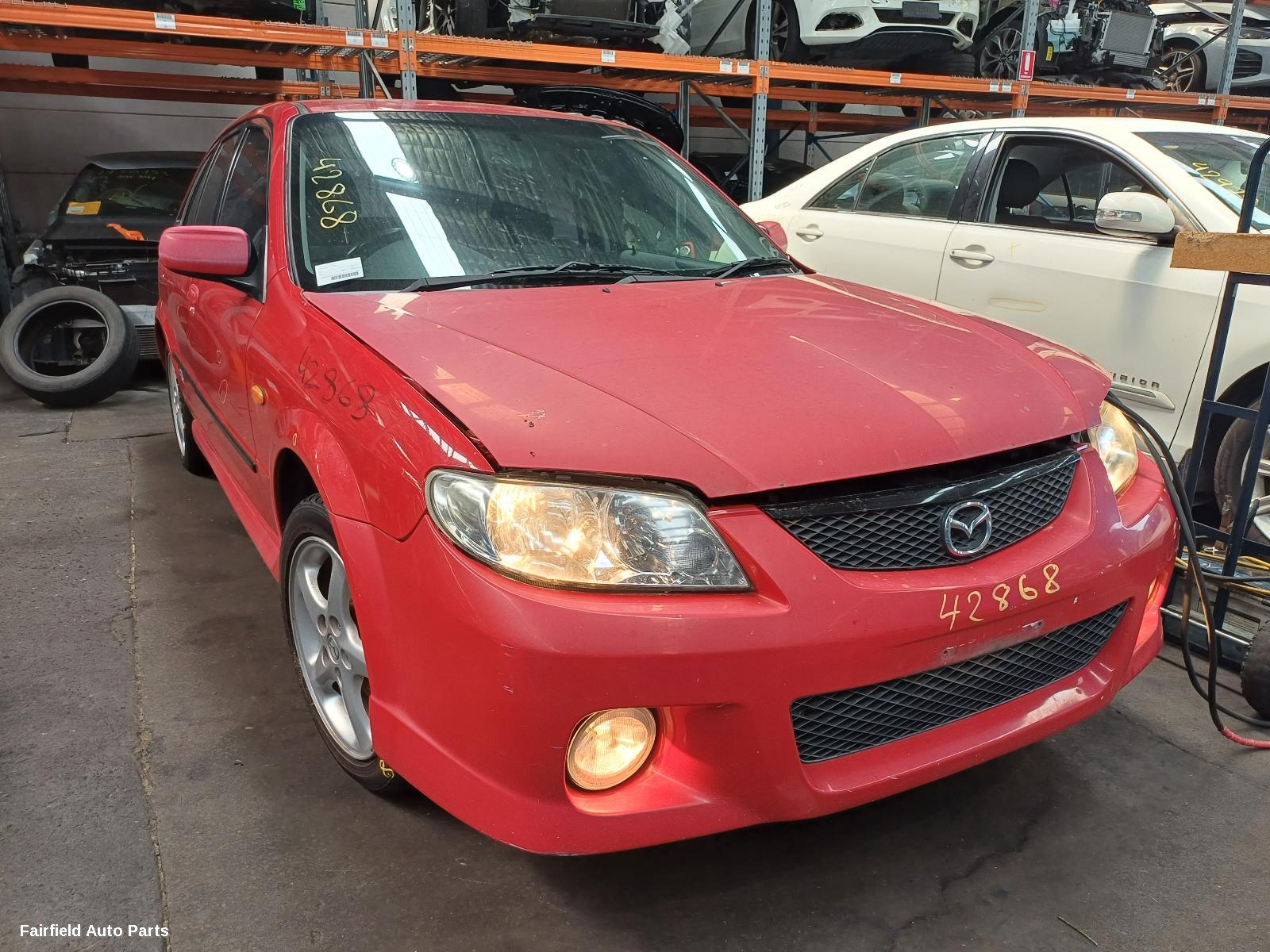 2001 Mazda 323 Washer Bottle