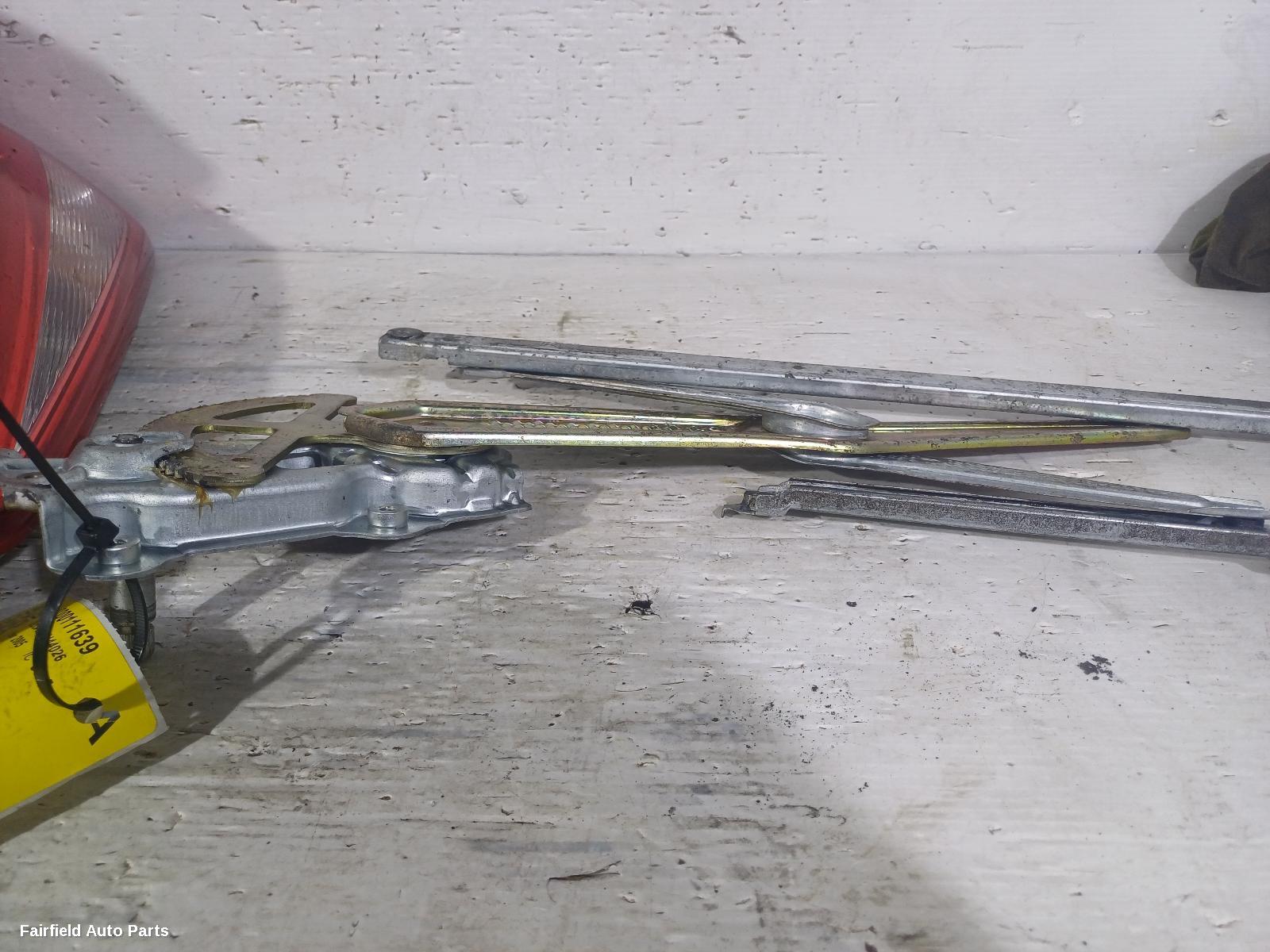 1999-2005 Toyota Echo Left Front Window Reg Motor