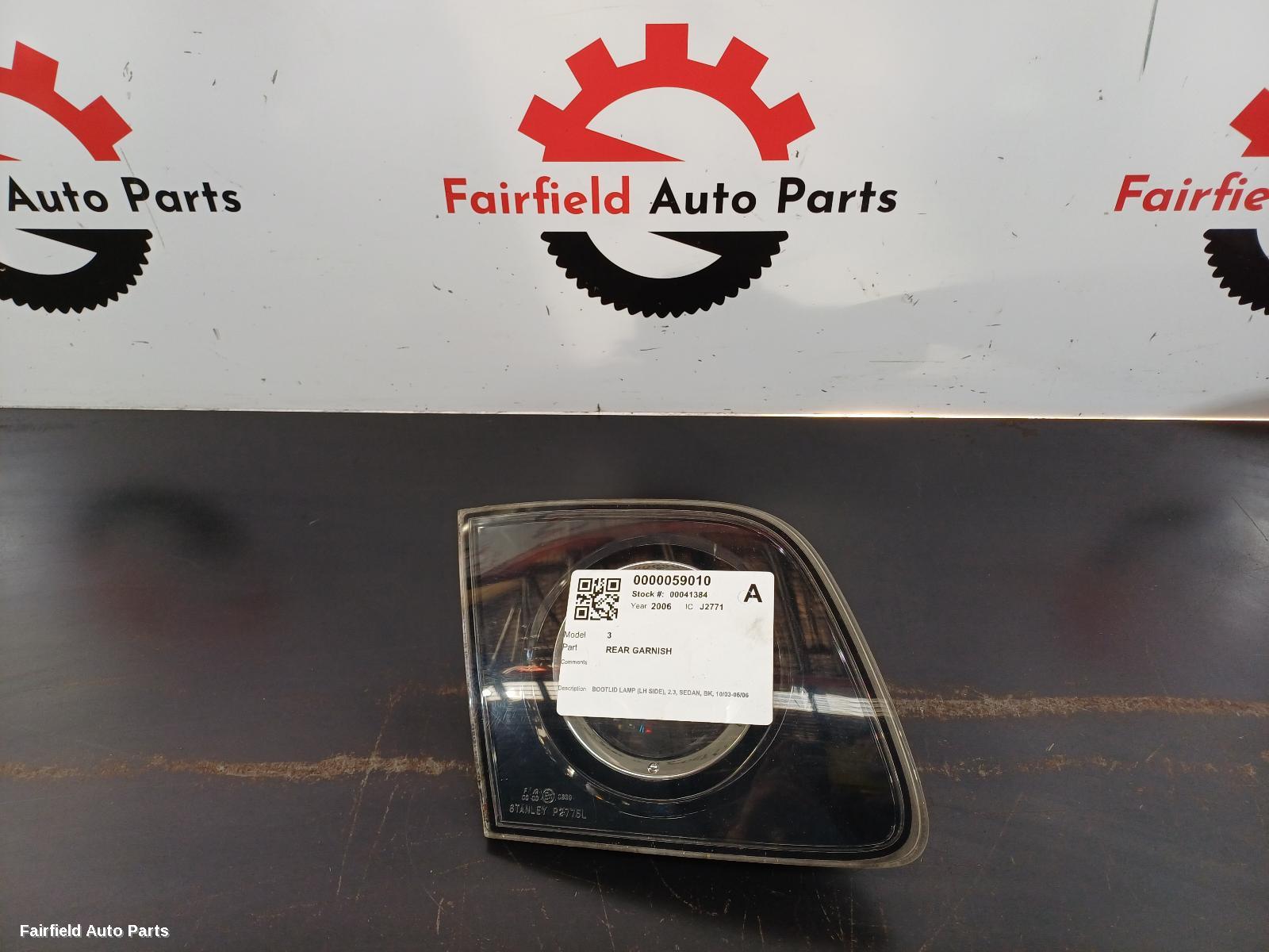 2003-2006 Mazda 3 Rear Garnish
