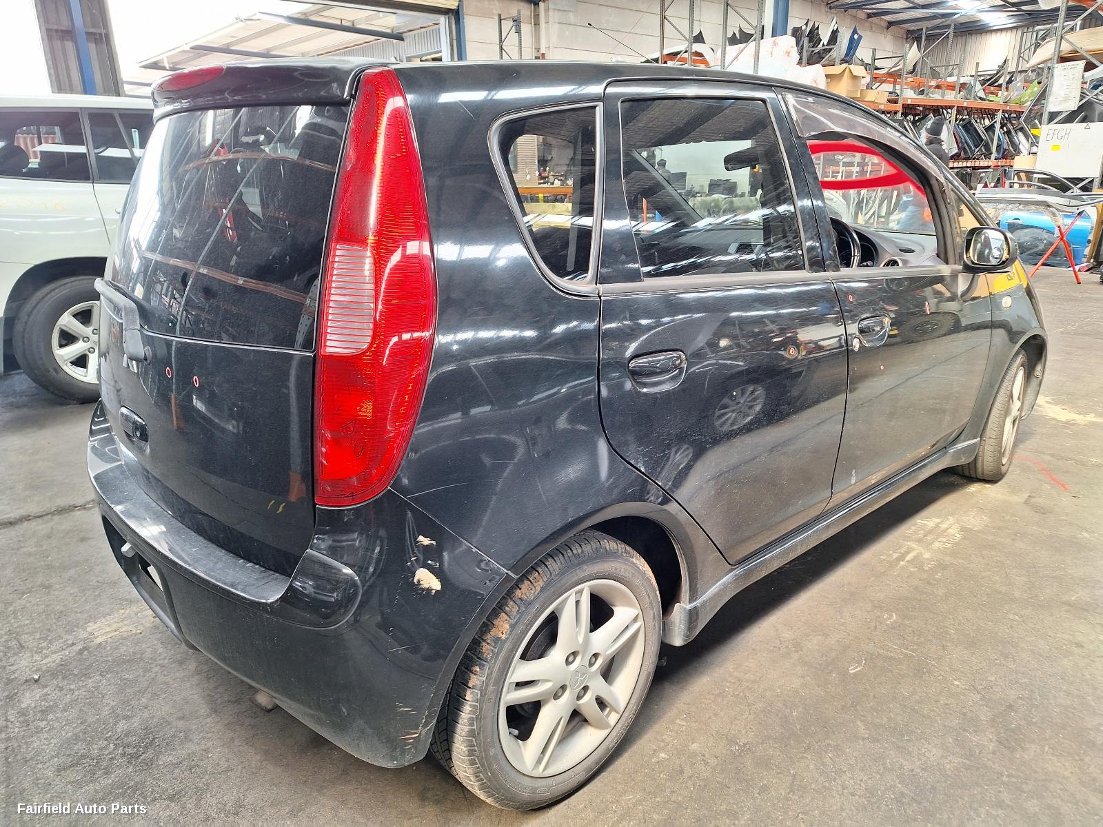 2002-2005 Mitsubishi Colt Grille