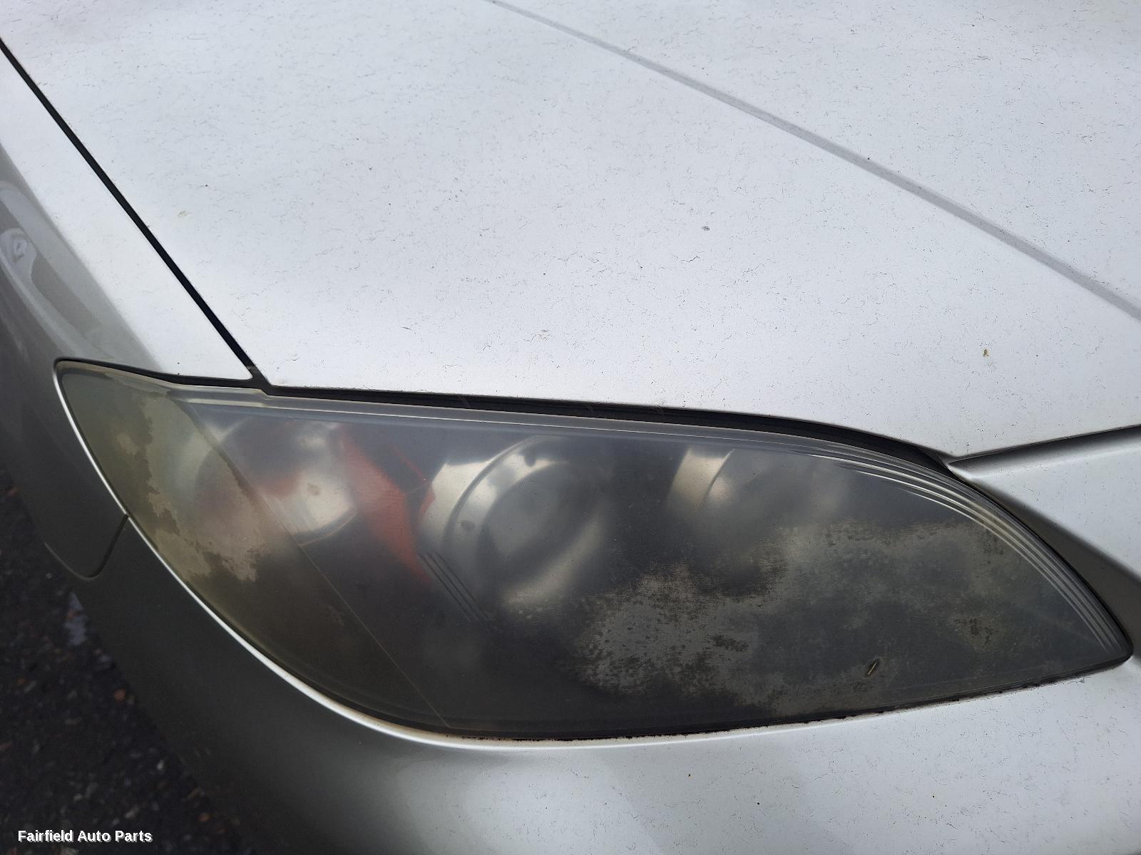 2003-2006 Mazda 3 Rear Garnish
