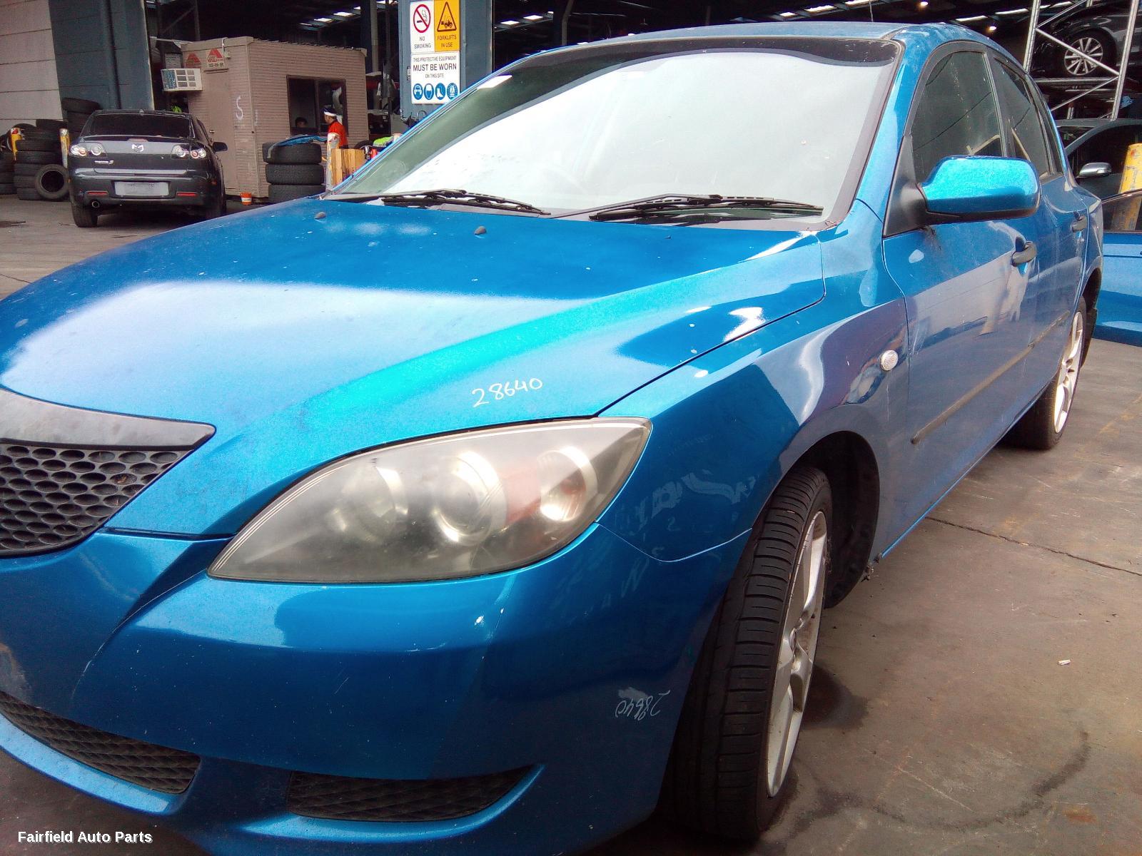 2003-2006 Mazda 3 Rear Garnish