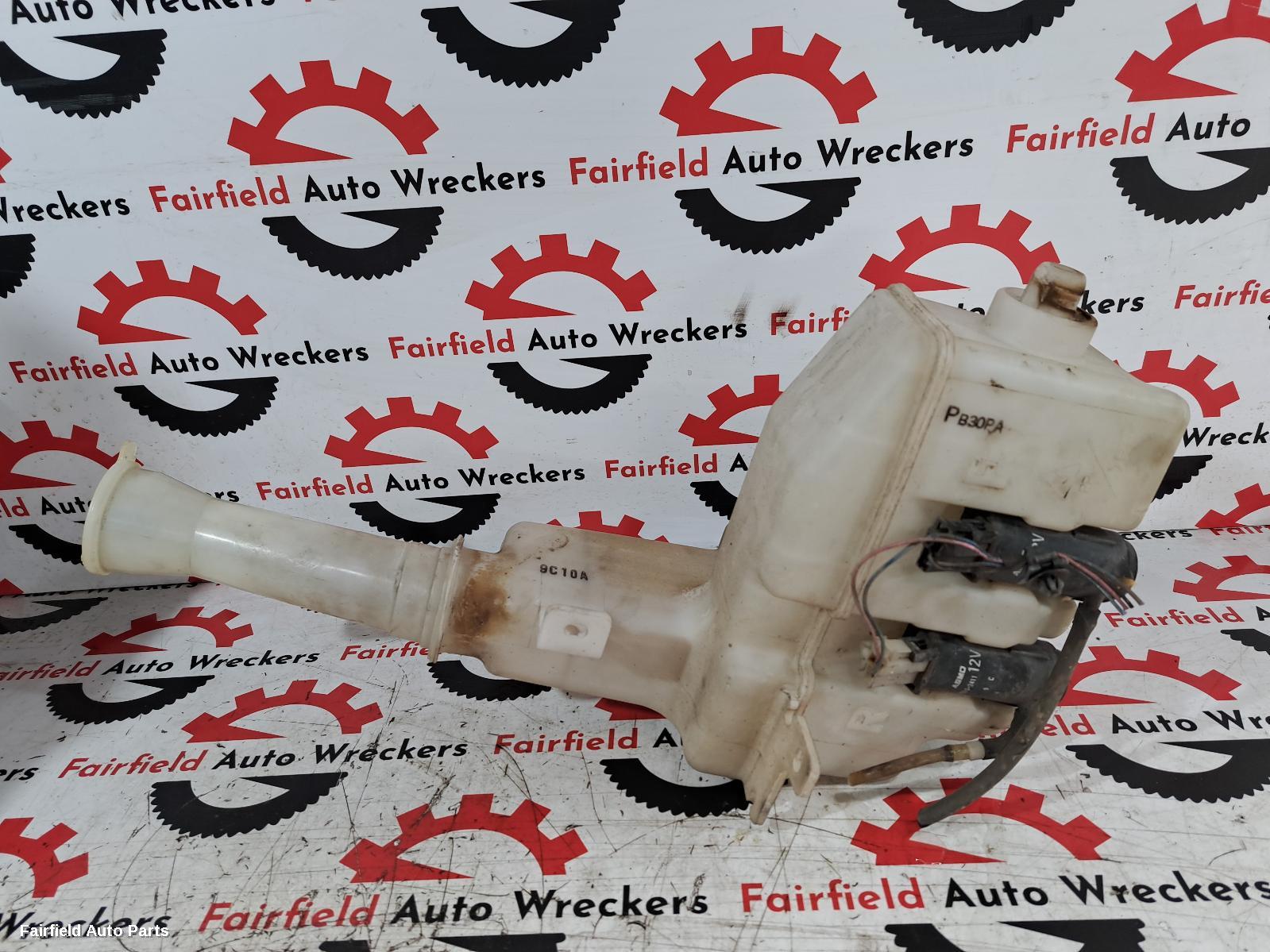 1998-2003 Mazda 323 Washer Bottle